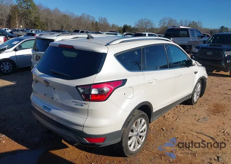 2018 Ford Escape Titanium z USA, uszkodzony, nr VIN 1FMCU9J94JUD17997